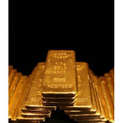 La imagen muestra lingotes de oro.