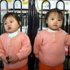 Unas niñas chinas huérfanas esperan a ser adoptadas en uno de los orfanatos del país