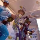 Rebellin, Di Luca y Contador descorchan el cava en el podio final