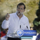 Mariano Rajoy, durante su intervención en el acto del PP celebrado en Soutomior, en Galicia, este domingo.