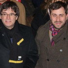 Carles Puigdemont y Toni Comín, en un acto en Lovaina el pasado 6 de febrero.