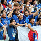 Aficionados japoneses durante el partido contra Polonia.