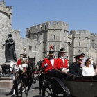 Meghan y Enrique dejan en carroza el castillo de Windsor tras su boda, en mayo del 2018.