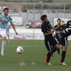 Alcaide y Sergio chocan entre sí al hacer barrera ante el lanzamiento de un rival.