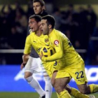 Rossi celebra el segundo gol del equipo amarillo, durante el encuentro contra el Valencia.