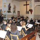 Última de las actuaciones de la banda de música en la iglesia de la villa de Cistierna. CAMPOS