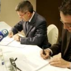 Fernández y Chamorro rubricaron el acuerdo elaborado en los últimos días