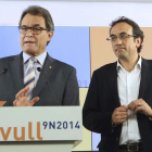 Mas, junto al nuevo coordinador general del partido, Rull.