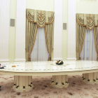 Imagen de Putin en la mesa con el canciller alemán. KREMLIN POOL