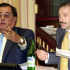 Los exdiputados del PP Luis Ramallo y Vicente Martínez-Pujalte, en sendas imágenes del 2001.