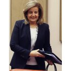 La ministra de Empleo y Seguridad Social, Fátima Báñez, responde a las cuestiones planteadas en materia de pensiones y el Fondo de Reserva.