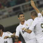 Ronaldo y Karim Benzema celebran un gol durante el amistoso contra el Tianjin.