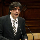 El candidato de Junts pel Sí a la Presidencia de la Generalitat, Carles Puigdemont, pronuncia su discurso en el pleno del Parlament de Cataluña en el que se debate su investidura como nuevo presidente catalán.