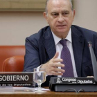El ministro Jorge Fernández Díaz, durante su comparecencia en la comisión de Interior del Congreso de los Diputados.