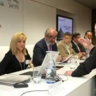 Lagartos, Carrasco, Llamas y Fernández, en la asamblea general de Caja España celebrada ayer