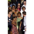 Michelle Obama, en el centro de la imagen.