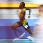 Usain Bolt, en su serie clasificatoria de 200 metros, en Moscú.