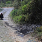 Una fotógrafa retrata la zona en la que se ha hallado un cadáver calcinado en Begues (Baix Llobregat)