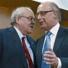 El 'conseller' de Economia, Andreu Mas-Colell, y el ministro de Hacienda, Cristóbal Montoro, en la reunión del Consejo de Política Fiscal y Financiera.