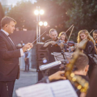 Fotografía de una orquesta en una actuación. DL