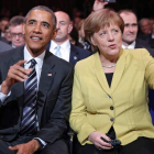 Obama y Merkel, ayer en un momento de su encuentro en Hannover. CHRISTIAN CHARISIUS