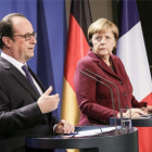 Hollande y Merkel, en la rueda de prensa tras la reunión del Cuarteto de Normandía.