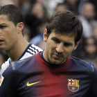 El jugador culé Messi y el delantero del Real Madrid Cristiano Ronaldo afinan para el Clásico