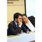 Pere Aragonès (izquierda) y Oriol Junqueras, ayer, durante la presentación del informe de la economía catalana.