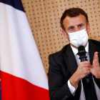 Emmanuel Macron ayer, en un acto público en París. CHRISTIAN HARTMANN