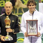 Davydenko y Nadal posan tras la entrega de premios.
