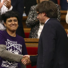 La diputada de la CUP, Anna Gabriel, y el president de la Generalitat, Carles Puigdemont.