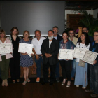 Los premiados en una foto de familia.