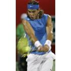 Nadal devuelve la bola a Daghdatis, ayer