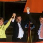 Aguirre, Rajoy y Ruiz Gallardón, en la sede del PP anoche