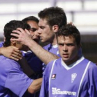 Los jugadores bañezanos celebran uno de los seis goles que materializaron frente al Béjar Industrial
