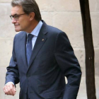 El president de la Generalitat, Artur Mas, llega a la reunión semanal del Gobierno catalán, ayer.