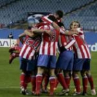 Los jugadores del Atlético festejan el pase ante un Calderón vacío