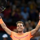 Rafael Nadal festeja su victoria en Brisbane.
