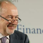El presidente de Caja Madrid, Rodrigo Rato, durante la intervención de ayer.