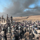 Miembros del Ejército iraquí celebran la toma de nuevas posiciones en las proximidades de Mosul, el pasado jueves.