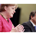 Angela Merkel junto a José Manuel Durao Barroso en Bruselas.
