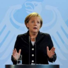 Angela Merkel, durante la rueda de prensa ofrecida ayer en la cancillería de Berlín.
