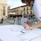 Un momento de la preparación ayer del libro gigante por una vida sin malos tratos
