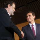 Mariano Rajoy y Albert Rivera, el día que sellaron el acuerdo para la investidura. JUAN CARLOS HIDALGO