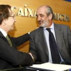 José Luis Méndez y Santos Llamas, tras la firma del convenio