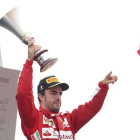 Fernando Alonso, en el podio de Monza.