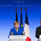 La cancillera alemana Angela Merkel y el presidente de Francia Emmanuel Macron.