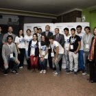 Imagen de familia del consejero de Educación con los participantes en el programa.