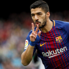El delantero uruguayo del Barcelona, Luis Suárez, festeja el gol marcado contra el Valencia,durante el partido correspondiente a la jornada 32 de LaLiga disputado en el Camp Nou de Barcelona.