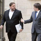 El vicepresidente de la Generalitat, Oriol Junqueras, y el presidente, Carles Puigdemont. MARTA PÉREZ